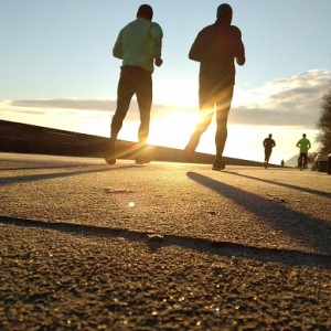 How can a tarsal coalition start causing pain in a runner?