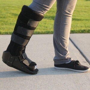 What does a fracture walking boot do?