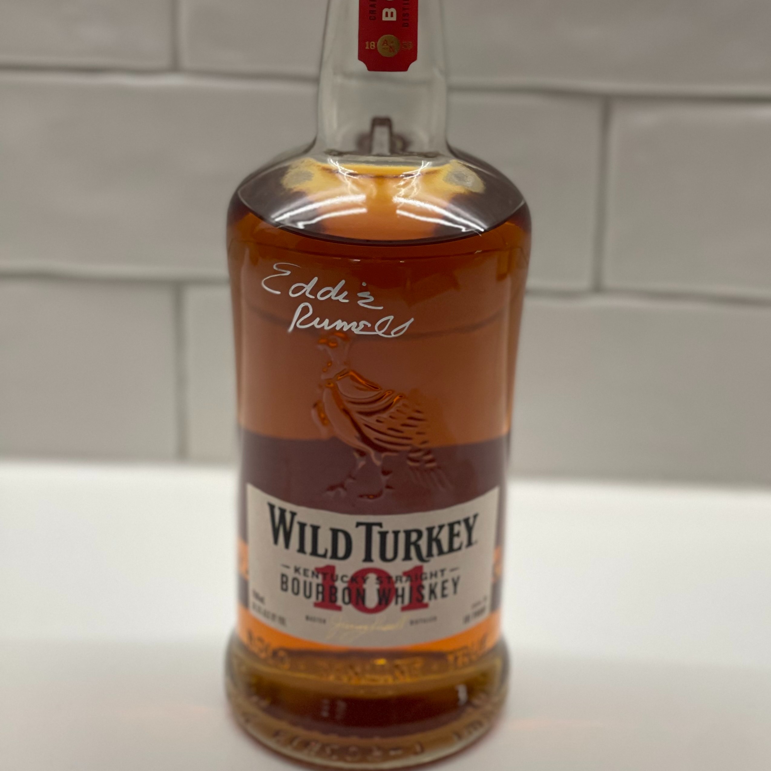 Wild Turkey 101 and Eddie Russell in an IGA