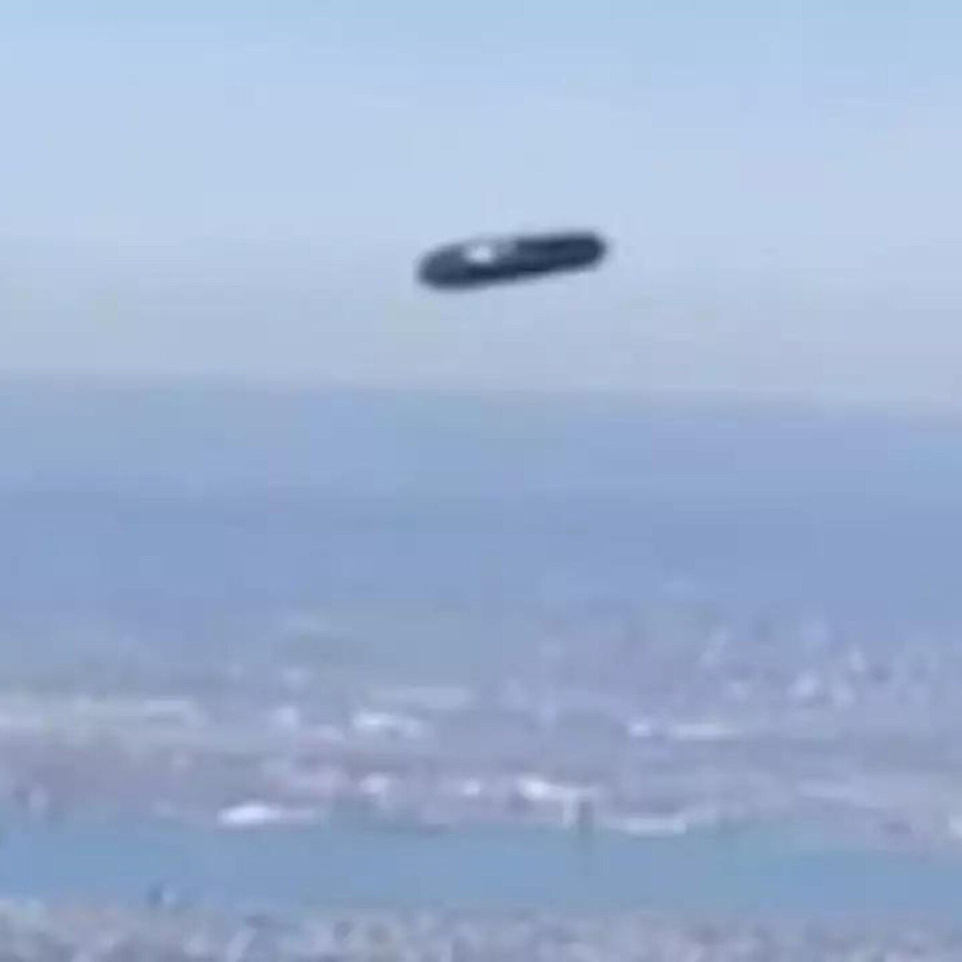 UFO News - Airline Passenger Captures Clear Photo of UFO During Flight Over New York City