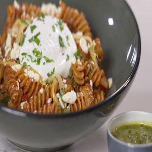Chickpea Rotini with Spicy Eggplant Shakshuka, Poached Egg, and Zhug