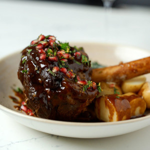 Pomegranate Glazed American Lamb Shank with Creamed Kale