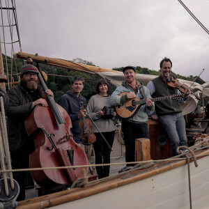 Jon Boden, Seth Lakeman, Ben Nicholls, Emily Portman and Jack Rutter on a tall ship