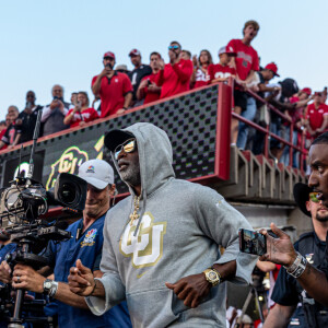 Deion "Coach Prime" Sanders, QB Shedeur Sanders & S Cam'Ron Silmon-Craig after CU's loss at Nebraska